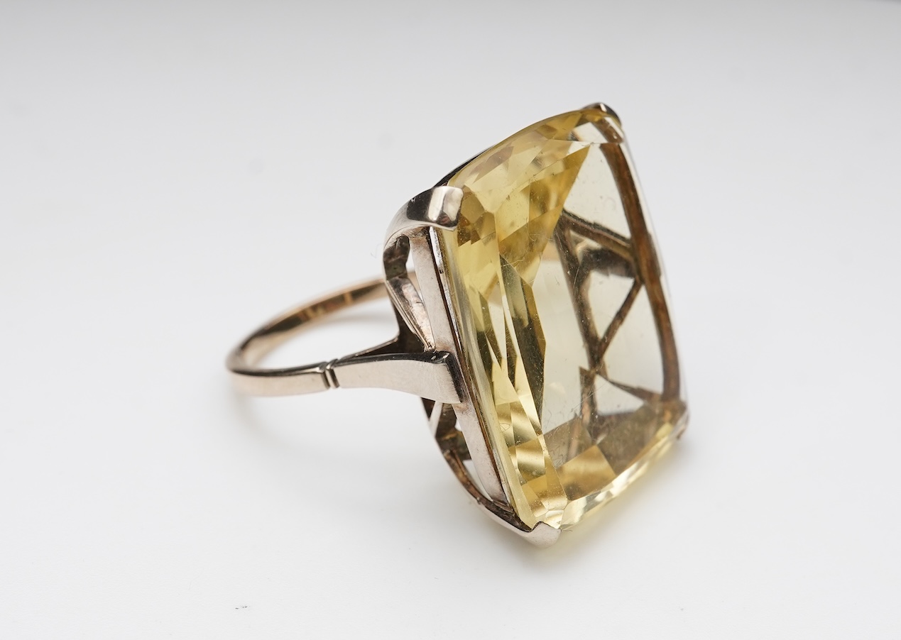 A collection of citrine jewels and a paste bracelet